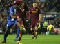 Mario Balotelli strikes to score the opener against Wigan on November 28, 2012