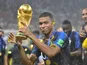 France's Kylian Mbappe with the World Cup trophy in 2018
