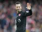 Referee Mark Clattenburg gestures during the North London derby between Arsenal and Tottenham Hotspur at the Emirates Stadium on November 6, 2016