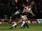 Ken Pisi tackles Ulster's Iain Henderson during a Heineken Cup match on December 7, 2012