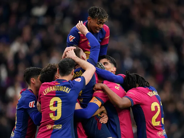 Catch us if you can: Barcelona ease past 10-man Sociedad to go top