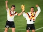 Germany captain Lothar Matthaus lifts the World Cup trophy on July 08, 1990.