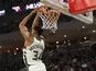Milwaukee Bucks forward Giannis Antetokounmpo (34) dunks during the third quarter against the Portland Trail Blazers at Fiserv Forum on November 22, 2019
