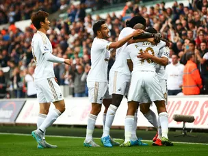 Harry Kane own goal puts Swansea in front