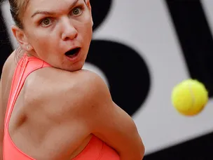 Halep breezes into Rome semi-finals