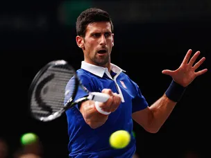 Djokovic outlasts Wawrinka to reach Paris final