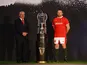 Wales' Ken Owens and head coach Warren Gatland pose with the Six Nations trophy during the launch on January 23, 2023