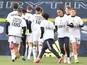 Leeds United players during the warm up before the match wearing UEFA Champions League T- Shirts with messages saying Football is for the Fans and Earn It