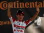 Lotto Soudal rider Caleb Ewan of Australia celebrates winning the stage on the podium on July 17, 2019