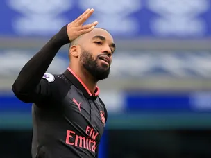 Lacazette starts against United