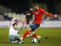 Bournemouth's Lewis Cook in action with Luton Town's Martin Cranie on December 19, 2020