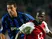 Arsenal's Lauren in action with Inter Milan's Kily Gonzalez on September 17, 2003