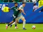 Saudi Arabia's Mohamed Abu Al Shamat and Matias Vina of Uruguay on June 15, 2026