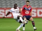 Lille's Benjamin Andre in action with OGC Nice's Hassane Kamara, May 1, 2021