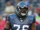Okung hails "amazing" Wilson