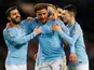 Manchester City defender Kyle Walker celebrates with teammates after scoring in the EFL Cup semi-final against Burton Albion on January 9, 2019
