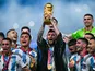 Argentina captain Lionel Messi lifts the 2022 FIFA World Cup Trophy in Qatar