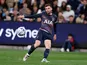 Andy Robertson of Tottenham Hotspurs crosses the ball