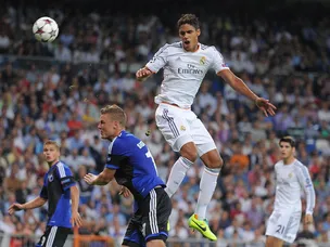 Varane double gives Madrid the lead