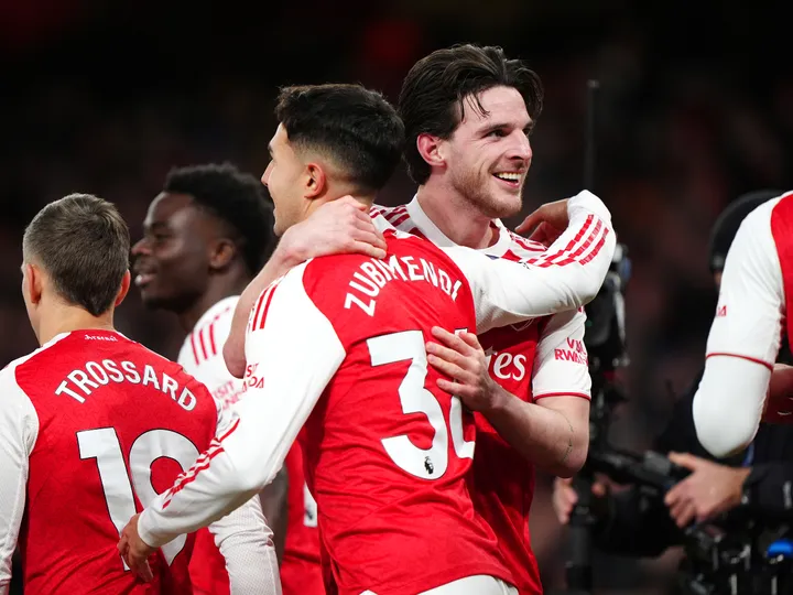 Odegaard and own goal combine as Arsenal return top with Brighton win
