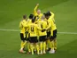 Borussia Dortmund's Erling Braut Haaland celebrates scoring a goal with teammates before it is disallowed following a referral to VAR on January 16, 2021