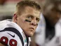 Defensive End JJ Watt looks on during the heavy loss to the Patriots on December 10, 2012