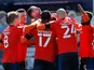 Luton Town's James Collins celebrates scoring their first goal against Watford in the Championship on April 17, 2021