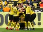 Paco Alcacer celebrates with Borussia Dortmund teammates on March 30, 2019