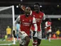 Arsenal's Alexandre Lacazette celebrates scoring their second goal with Bukayo Saka on February 24, 2022