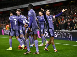 Liverpool punish wasteful Arsenal to advance in FA Cup