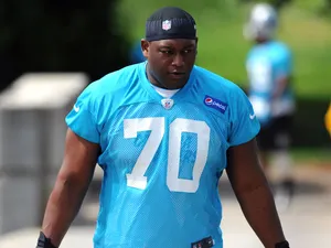 Edmund Kugbila of the Carolina Panthers walks toward the team's practice facility during the Panthers Rookie Camp on May 11, 2013 