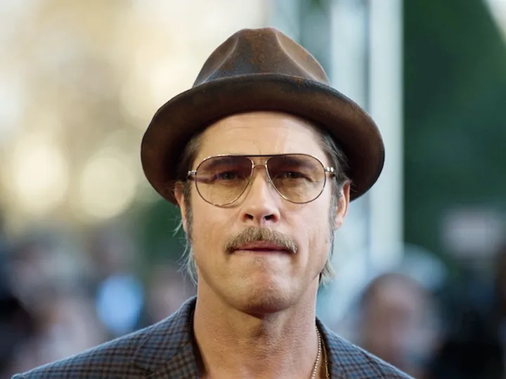 Brad Pitt attends British MotoGP