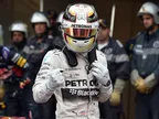 Hamilton fastest before crashing in wet P2