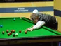 Michael White in action in his match against Mark Williams during the Snooker World Championship on April 21, 2013