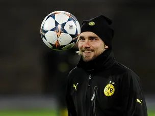 Schmelzer back in for Dortmund