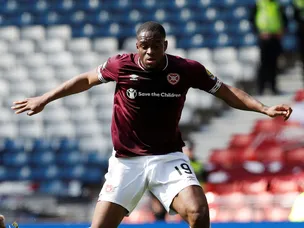 Uche Ikpeazu cancels winter break plans to help Hearts climb table
