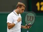 Dan Evans celebrates at Wimbledon on June 29, 2021