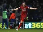 West Brom's Chris Brunt celebrates his opening goal against QPR on December 26, 2012