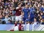 Aston Villa's Lucas Digne reacts after a challenge from Chelsea's Malo Gusto on September 24, 2023