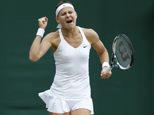 Lucie Safarova scrambles past Riske