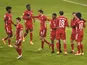 Bayern Munich's Thomas Muller celebrates scoring their second goal with teammates on January 17, 2021