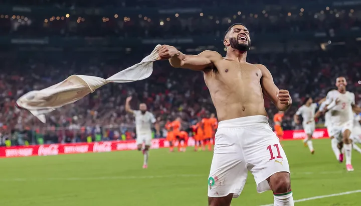 Morocco survive Verbruggen heroics to advance at World Cup