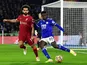 Leicester City's Wilfred Ndidi in action with Liverpool's Mohamed Salah on December 21, 2021