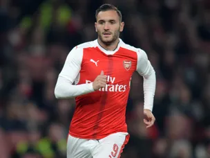 Arsenal top group after Lucas Perez treble