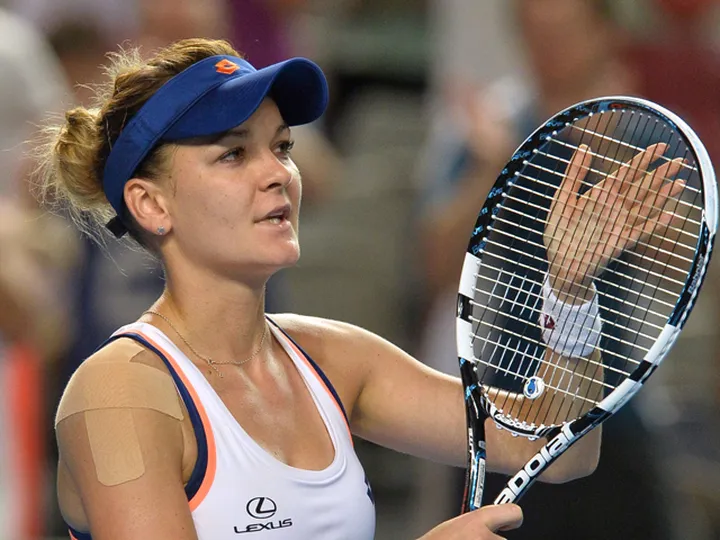 Radwanska breezes into final eight