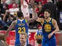 Golden State Warriors guard Klay Thompson (11) celebrates with forward Draymond Green (23) after Green scored a three-point basket in overtime against the Portland Trail Blazers in game four of the Western conference finals of the 2019 NBA Playoffs at Mod