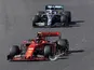 Ferrari's Charles Leclerc with a damaged front wing and Mercedes' Lewis Hamilton in action during the race