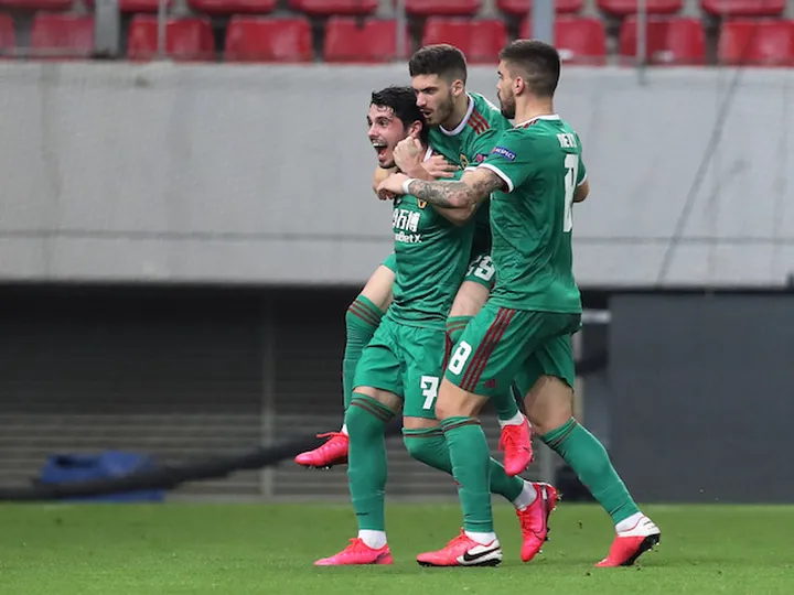 Wolves score valuable away goal in draw with 10-man Olympiacos