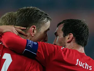 Austria edge out USA