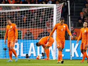 Chris Coleman wary of "wounded" Netherlands